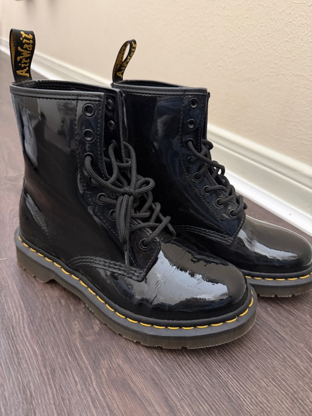 Dr. Martens Black Patent 8-Eye Lace-Up Boots with Yellow Stitching